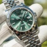 Rolex Datejust green dial watch with fluted bezel and Jubilee bracelet